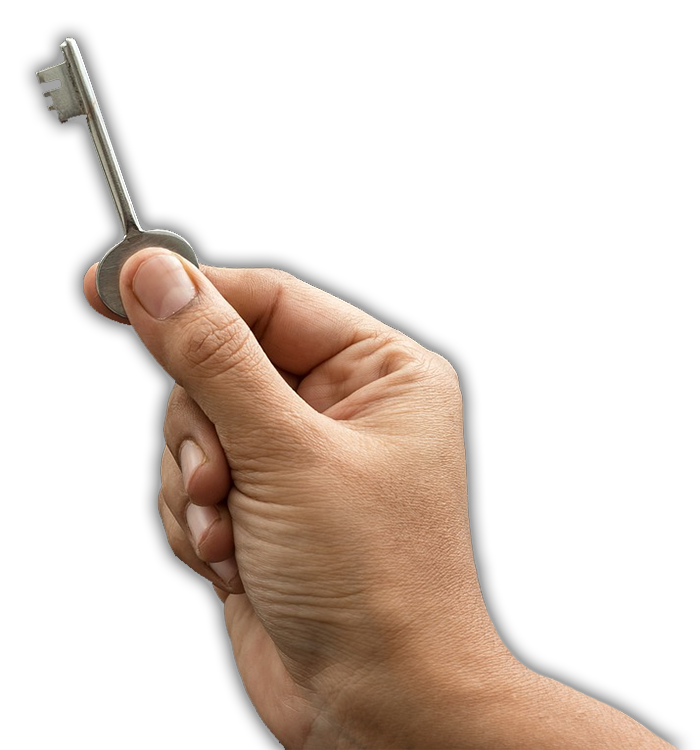 Adult hand holding up a key between thumb and first finger